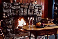 Romantic and cozy living rooms with woodburning fireplaces.